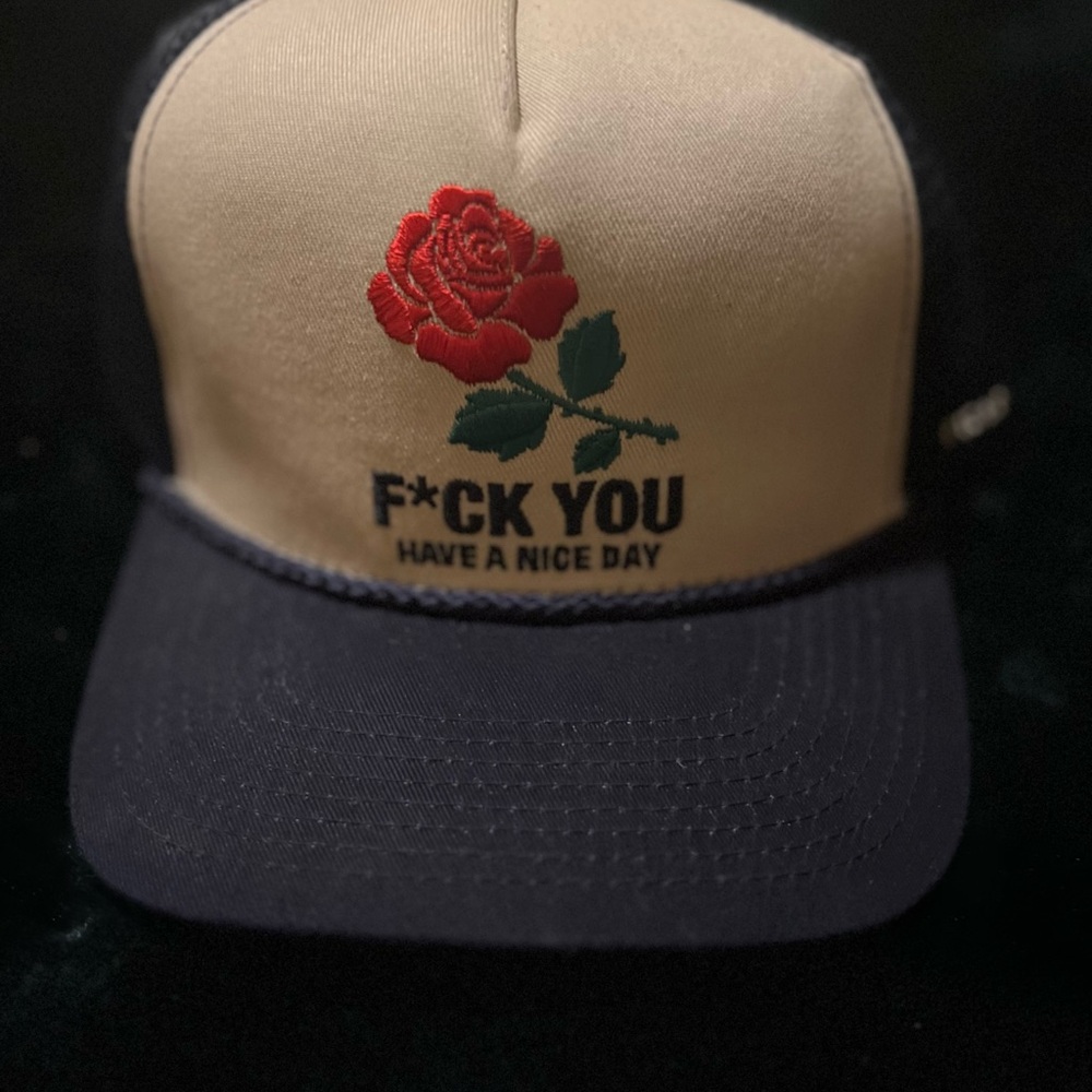 Black and Tan Trucker Hat with Rose Design
